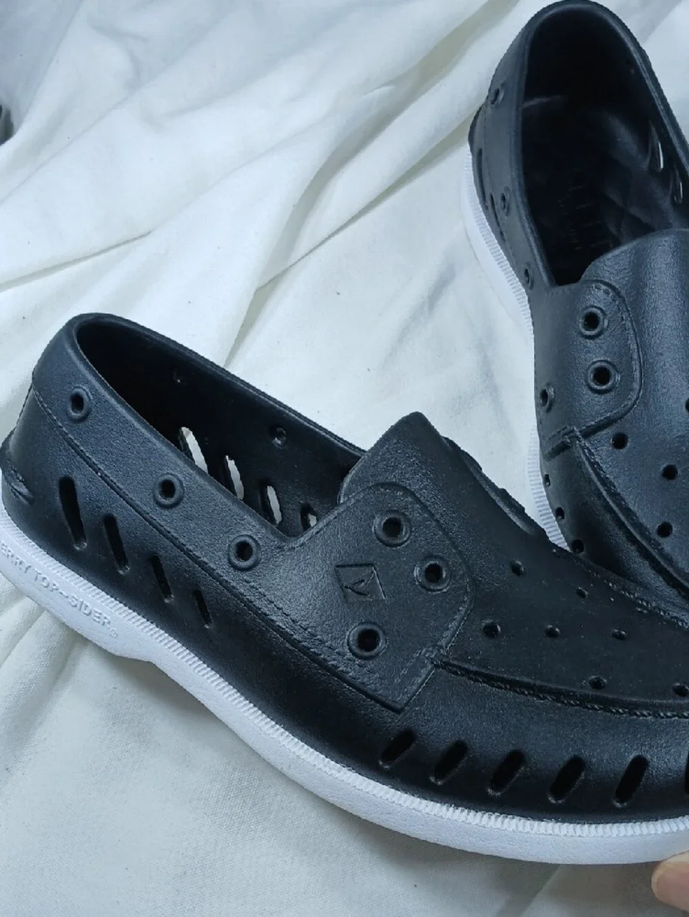Sperry Black Perforated Slip-On Boat Shoes with White Sole